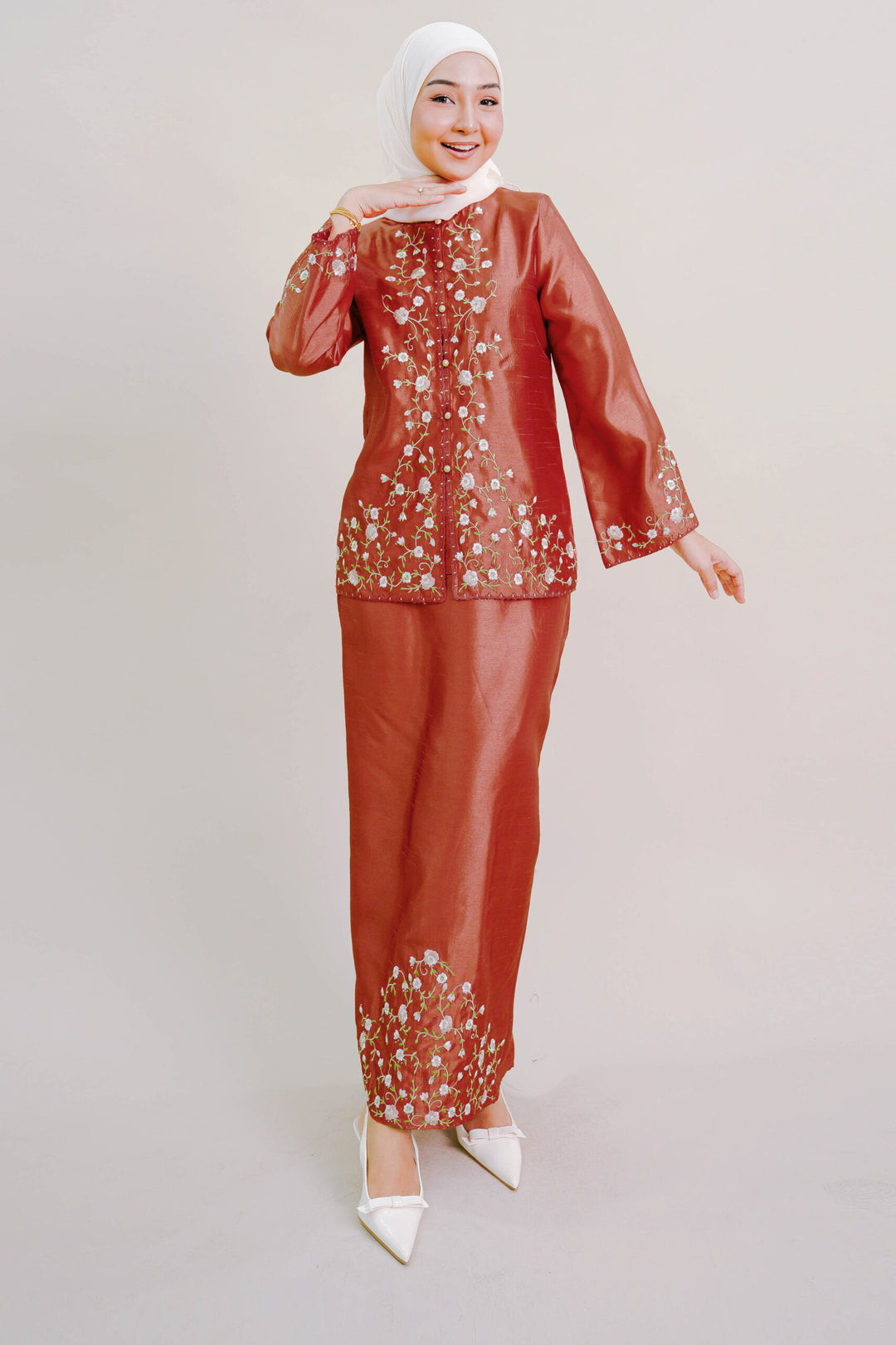 Shera Kurung in Orange
